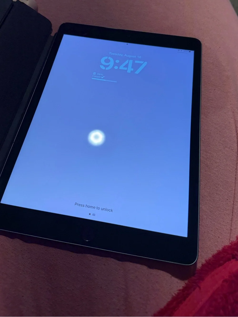 Apple iPad Tablet in Black with Blue Screen
